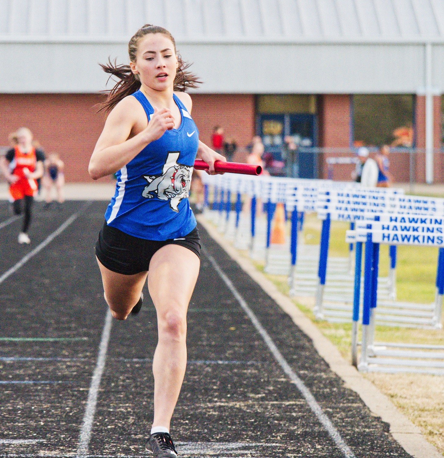 Brooklyn Marcee crosses the finish line in 3rd place for the Lady Bulldog 4x100m relay team. She won the long jump, pole vault, 100m hurdles and 300m hurdles, accounting for nearly half of Quitman's team points. [just a start - finish the album here]